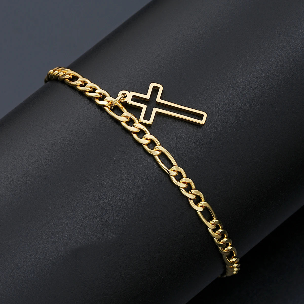 La Cruz gold Figaro chain bracelet with hollow cross charm