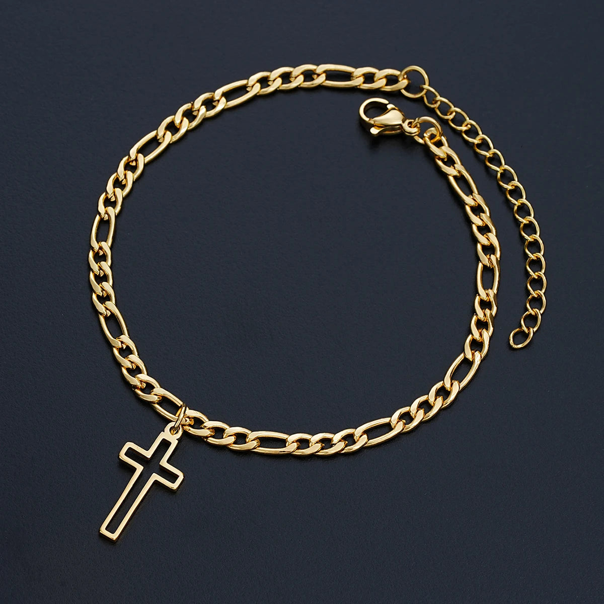 La Cruz gold cross charm bracelet with lobster clasp and 5cm extender chain