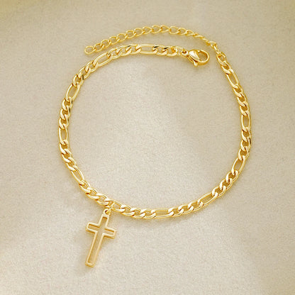 La Cruz gold-tone stainless steel cross bracelet laid flat