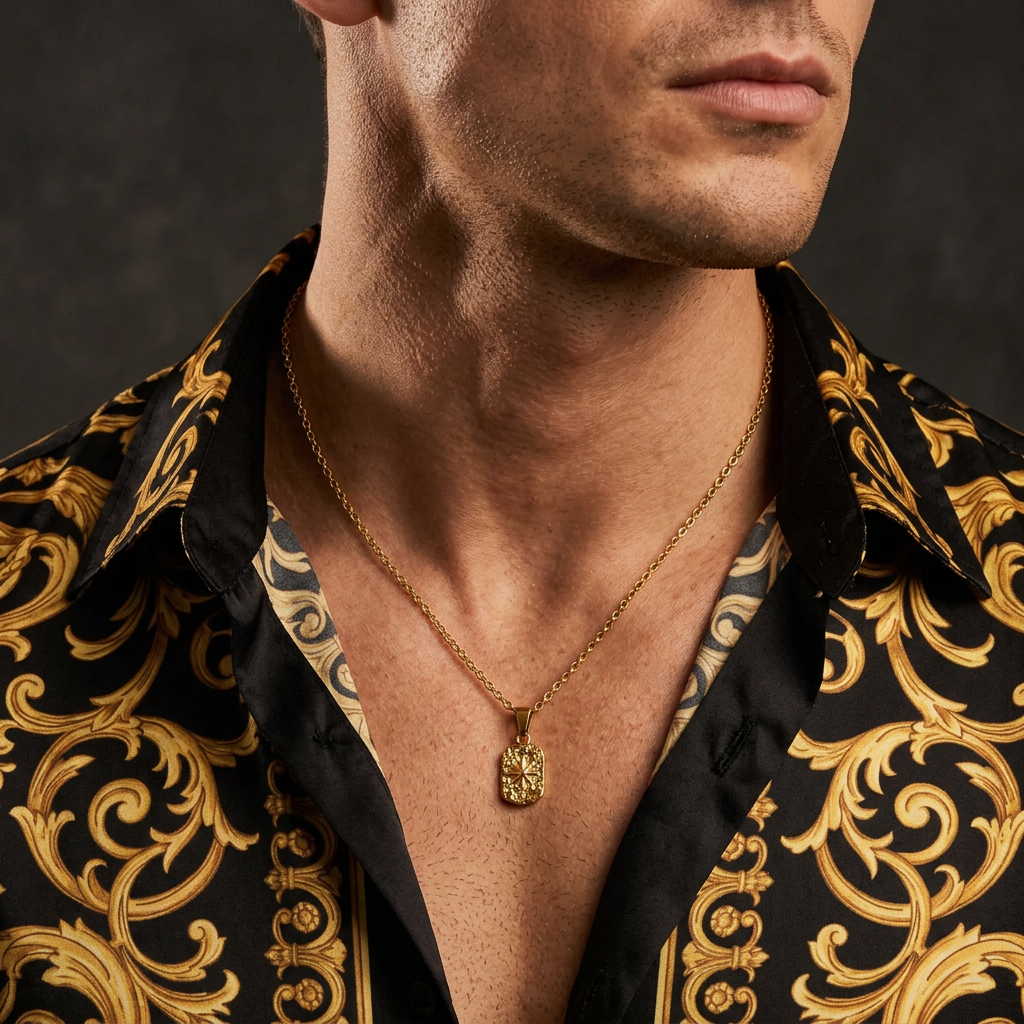 El Cartel male model wearing El Norte with a black-and-gold baroque shirt