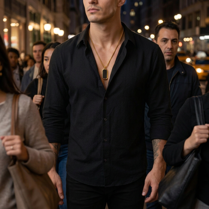 Model walking within a crowded New York-style street, with pedestrians beside him and in the foreground