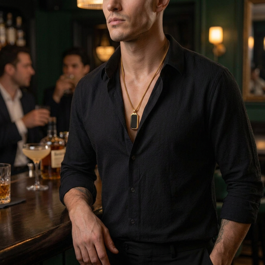 Same model at the bar with a relaxed, confident lean and small gold pendant